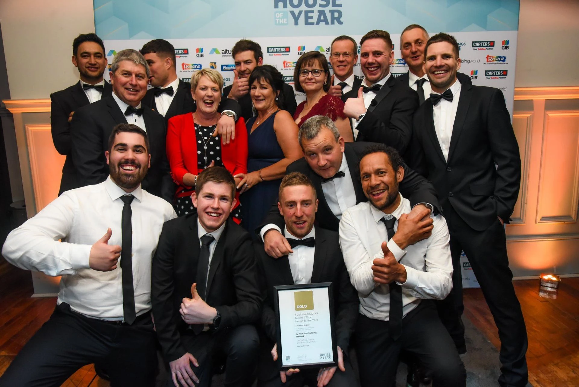 WHB group celebrating together at the House of the Year awards